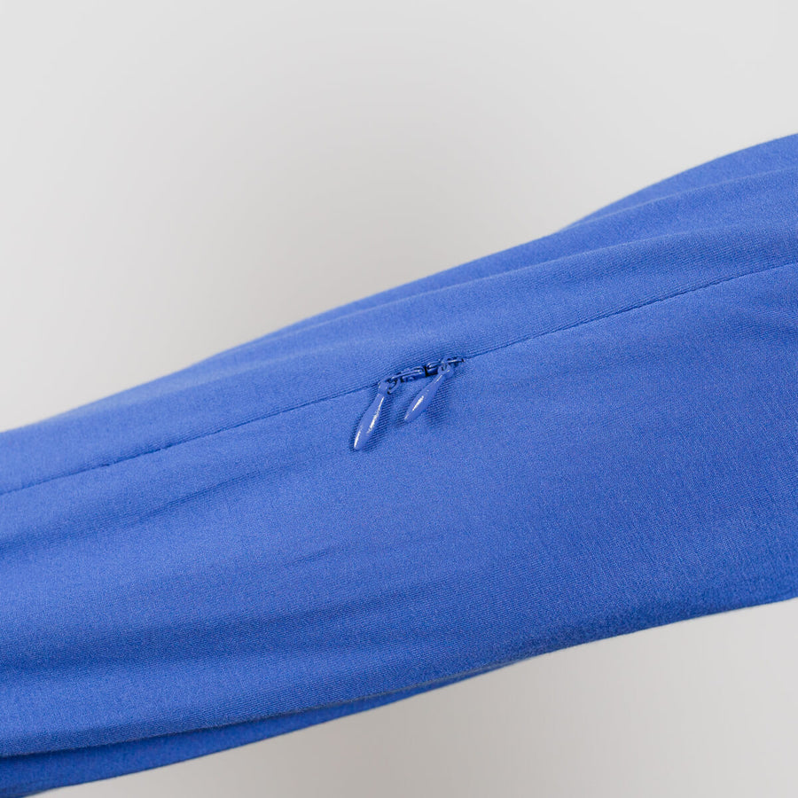 Close-up of blue bamboo IV zip hoodie showing hidden chest port zipper detail.
