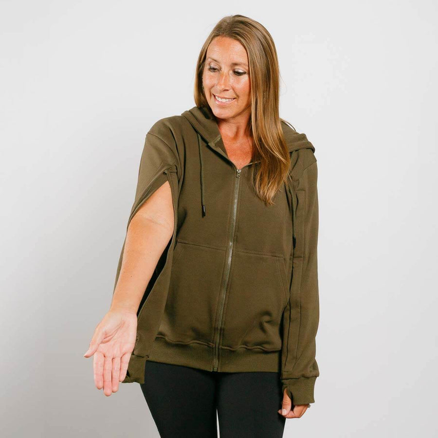 Woman wearing olive green IV zip hoodie with short sleeve zipper access, front view.