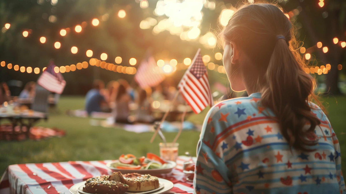 women looking at the food table at a 4th of july picnic