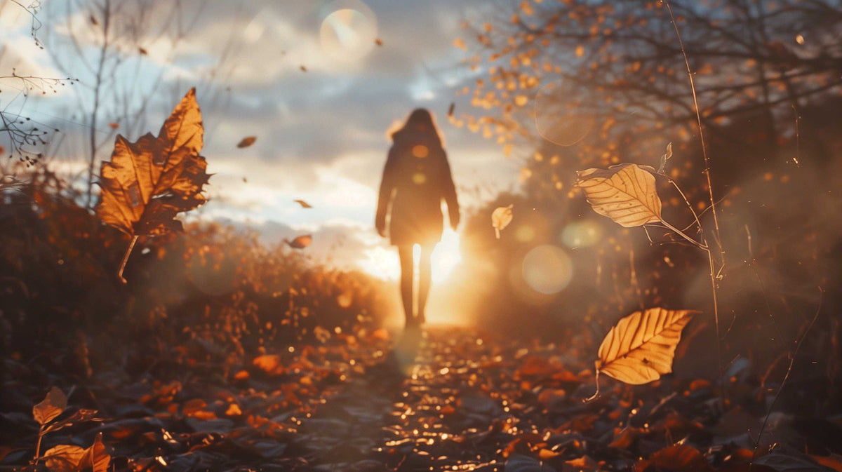 a person walking on a trail on a cold fall day