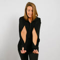 Woman wearing black bamboo IV zip hoodie with open side zippers for medical access, front view.