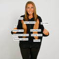 Woman wearing black zip hoodie with labeled medical procedures and devices marked across her body.