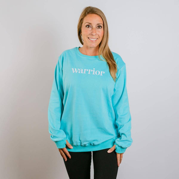 Warrior Crewneck Aqua | Model is 5'3" 130lbs wearing size S