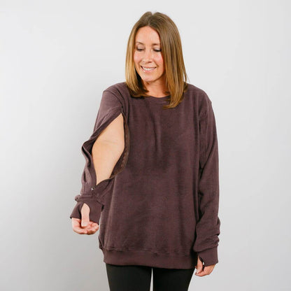 Woman wearing a brown oversized sweater against a plain background IV Crewneck Black #NEW | Model is 5'3" 130lbs wearing size S