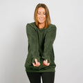 Woman wearing olive green IV crewneck with thumb hole sleeves, front view.