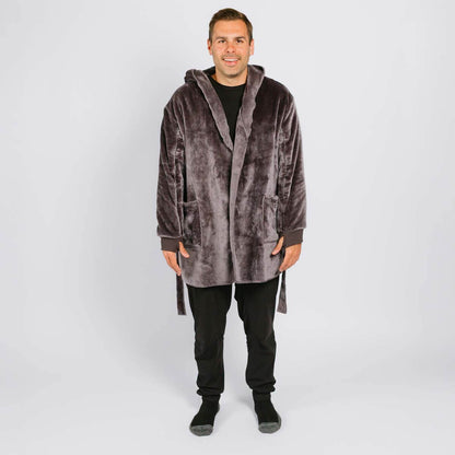 Man wearing a gray velvet hooded robe over black clothing against a white background.  | Model is 5'8" 165lbs wearing size M | Model is 5'8" 165lbs wearing size M