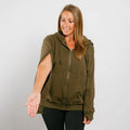 Woman wearing olive green IV zip hoodie with short sleeve zipper access, front view.