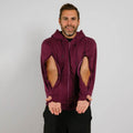 Man wearing maroon zip hoodie with open side cutouts, displaying the garment's unique design features. | Model is 5'8" 165lbs wearing size M