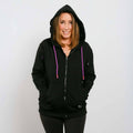 Woman wearing black IV zip hoodie with purple drawstrings, front view.