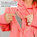 Woman in coral hoodie demonstrates dual front zippers that close around drawstrings for warmth.