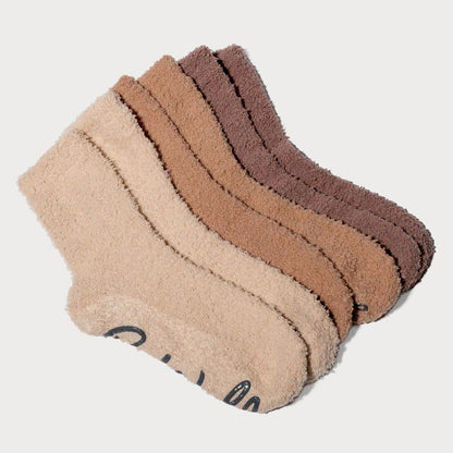 Three pairs of socks in beige, brown, and another shade of brown on a light gray background. #NEW
